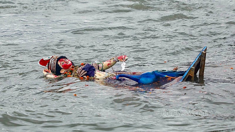 On the 10th day of the festival, devotees immersed their Goddess Durga idols in the Buriganga River at Dhaka's Waizghat on Thursday, Oct 2, 2025. Photo: Abdullah Al Momin