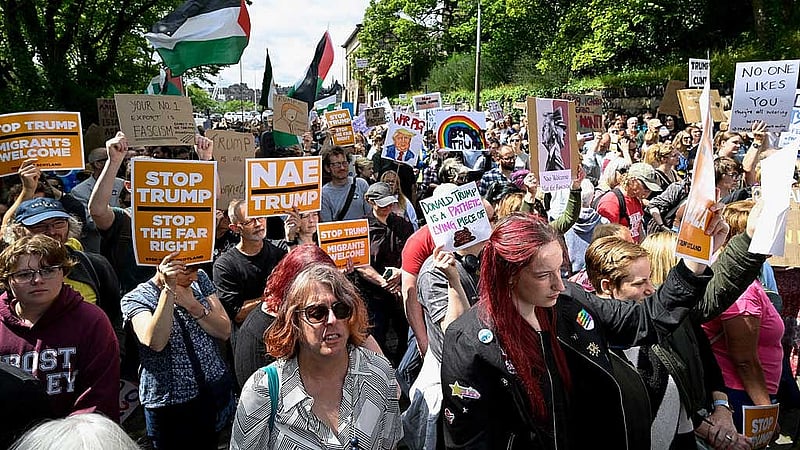 Anti-Trump demonstrators gather during a rally organised by the campaign group Stop Trump Coalition, protesting the visit of US President Donald Trump, in Edinburgh, Scotland, Britain, July 26, 2025. REUTERS