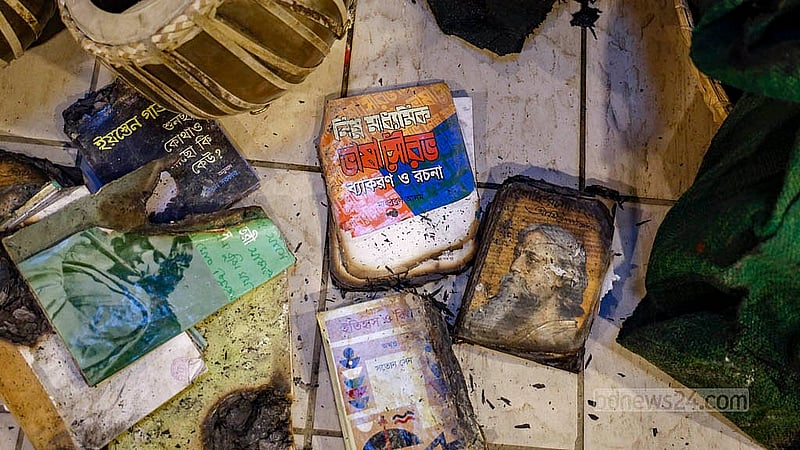 Burnt songbooks and shattered musical instruments remain inside Chhayanaut after the attack on Dec 18, 2025. Photo: Mahmud Zaman Ovi