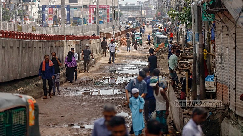 Rainwater has pooled on the broken road while drain repairs continue. The road from Postogola Bridge to Jatrabari intersection has been in poor condition for months. Photo: Mahmud Zaman Ovi