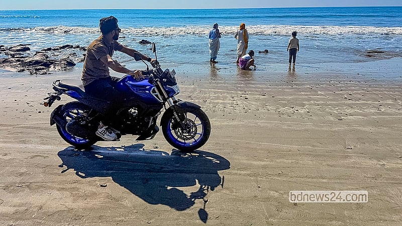 A tourist rides a motorcycle along the western beach of St Martin’s Island. Despite the ban, visitors can easily rent motorcycles after arriving on the island. Photo: Muhammad Mostafigur Rahman