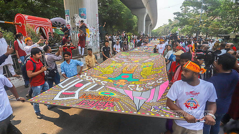 A vibrant addition to the Ananda Shobhajatra was a 100-foot-long scroll named “Banglar Pattachitra,” painted in the traditional Patta style of Bengal on Monday, Apr 14, 2025. Photo: Abdullah Al Momin
