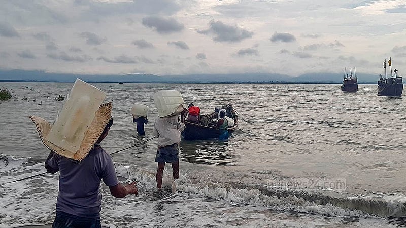 Fishermen from Teknaf’s Shah Porir Dwip take to the sea in their trawler after a 58-day ban on fishing. Photo: Jashim Mahmud