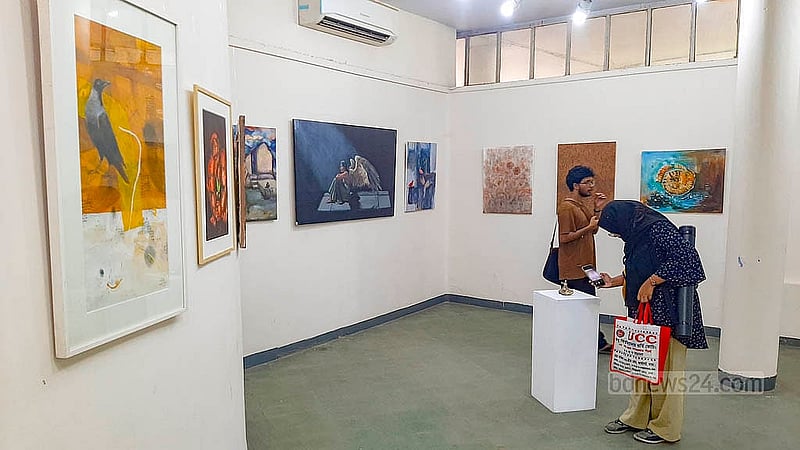 Visitors at the Zainul Gallery of the Faculty of Fine Arts at Dhaka University view works displayed to mark the birth centenary of artist SM Sultan. The exhibition will remain open until Aug 16. Photo: Abdullah Al Momin