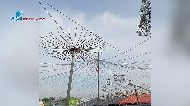 Stalls and rides are set up for visitors and families at the Rangpur Industry and Trade Fair 2025.