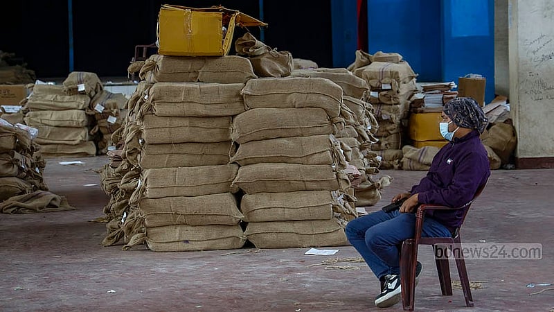 Sacks containing ballot papers for the referendum in Dhaka’s 20 constituencies are piled up inside the auditorium of Willes Little Flower School and College. Photo: Mahmud Zaman Ovi