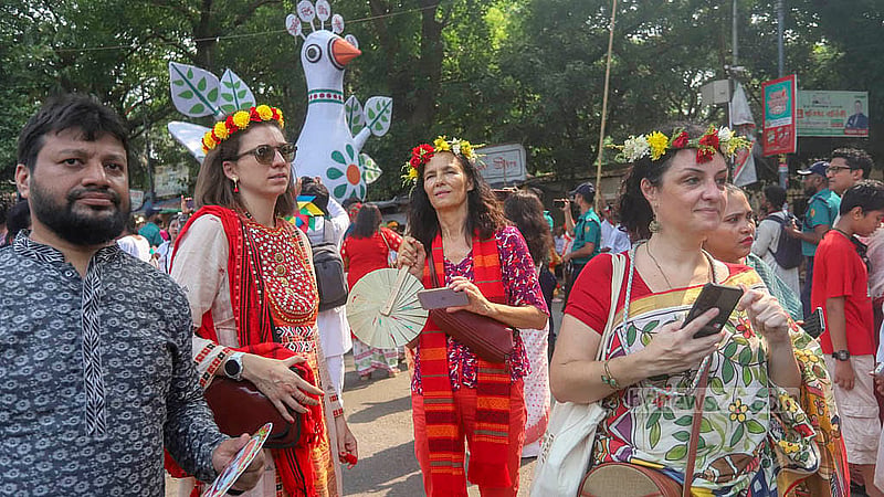 Many foreigners join the Bengali New Year’s Ananda Shobhajatra that began from the Faculty of Fine Arts at the University of Dhaka on Monday, Apr 14, 2025. Photo: Abdullah Al Momin