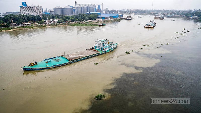 Boats once churned white foam through the river’s jet-black water. Because of the fresh rainwater, that foam is now rarely seen. Photo: Mahmud Zaman Ovi