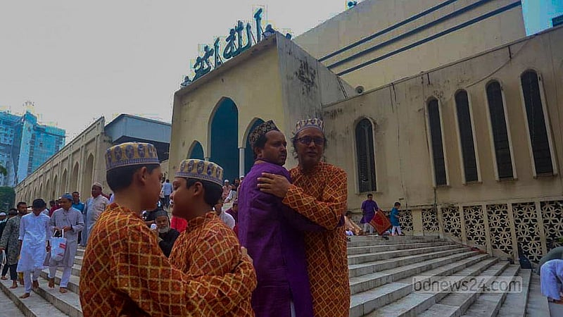 After the Eid prayers at Baitul Mukarram Mosque on Saturday, Jun 7, 2025, Muslims greet each other with a traditional embrace. Photo: Abdullah al Momin