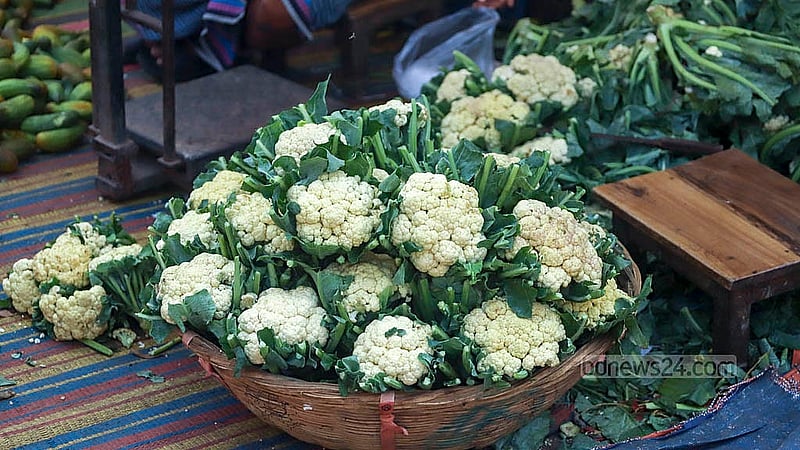 Cauliflower costs Tk 20 to Tk 45 each, depending on size. Photo: Abdullah al Momin
