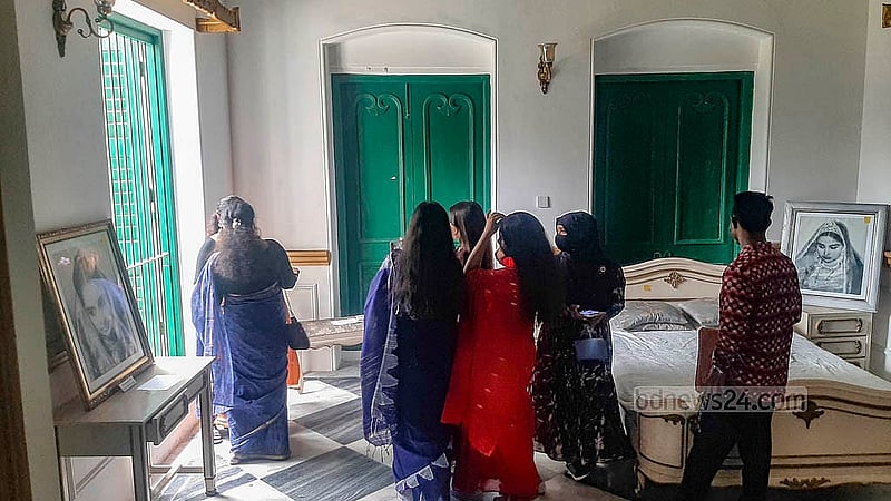 Visitors peer into the main building of the Rose Garden on KM Das Lane in Old Dhaka's Tikatuli. Photo: Abdullah Al Momin