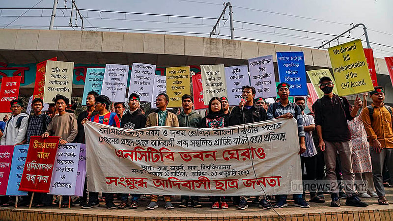 The Agitated Adivasi Students organised a rally at the foot of the Raju Memorial Sculpture at Dhaka University on Wednesday, Jan 15, 2025, protesting the removal of images featuring the word “adivasi” – a collective term for a number of ethnic minority groups in Bangladesh – from textbooks. Photo: Mahmud Zaman Ovi