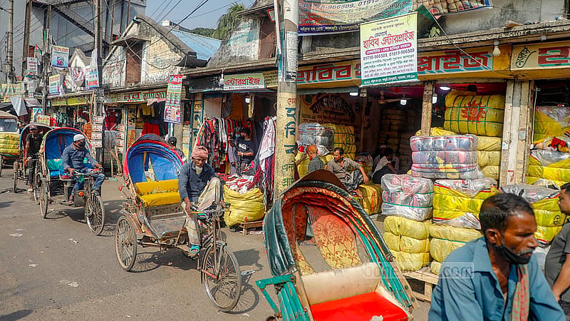 There are 20-25 wholesale shops selling old winter clothes in the Sadarghat area of Old Dhaka. Photo: Abdullah Al Momin