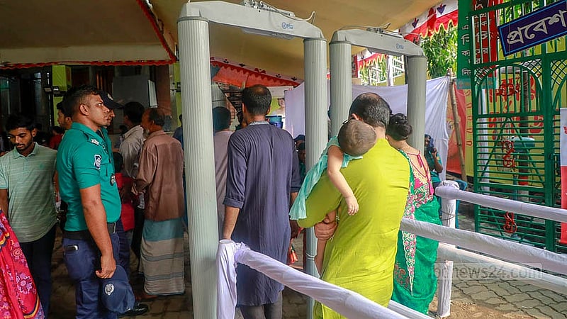 Police maintain tight security at the Dakeshwari National Temple on the occasion of Durga Puja on Thursday Oct 10, 2024.