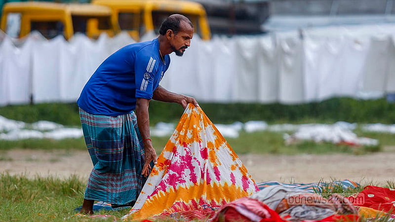 The rooms of the temporary court set up in the Alia madrasa field in Old Dhaka’s Bakshibazar have been closed since January. Washed clothes from decoration companies are now being dried in the empty field outside the court. Photo: Mahmud Zaman Ovi