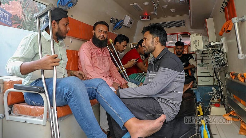 Following their agitation for improved treatment and rehabilitation, the injured participants of the Anti-discrimination Student Movement receiving care at the National Institute of Traumatology and Orthopaedic Rehabilitation, or NITOR, are travelling to the Secretariat for a meeting on Thursday, Nov 14, 2024. Photo: Mahmud Zaman Ovi