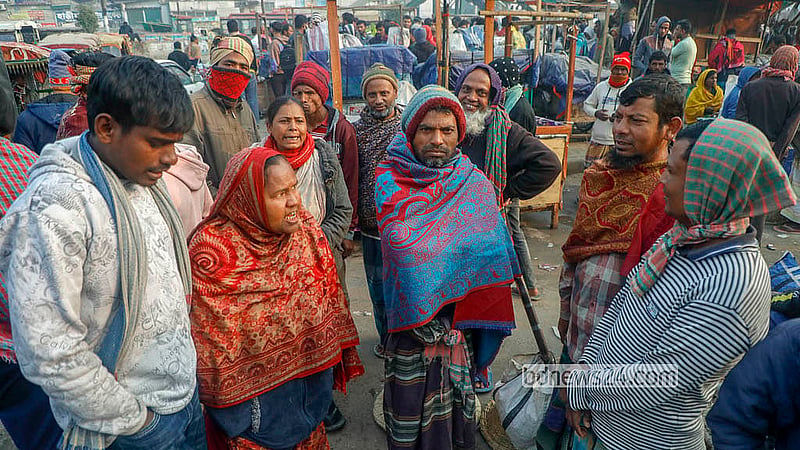 Every morning, a "market" for day labourers opens in the Hemayetpur bus terminal area of Savar, on the outskirts of Dhaka. Day labourers gather there early in the morning in search of work. Photo: Abdullah Al Momin
