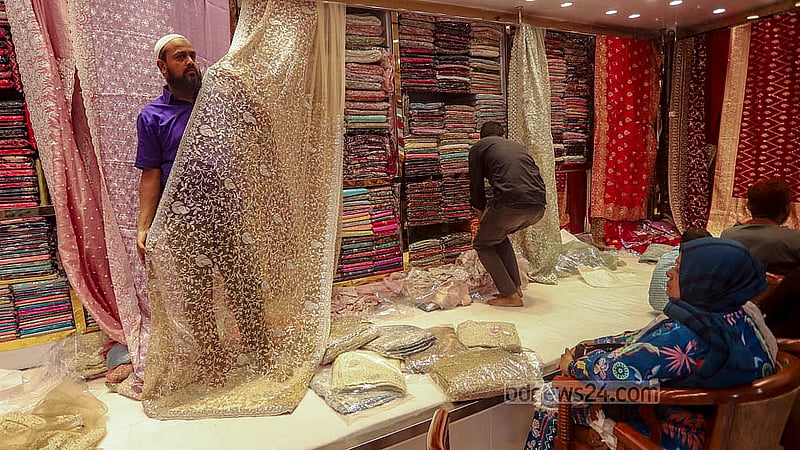 Traders display a wide variety of designs to catch the attention of potential customers as sales heat up at Benarasi Palli in Dhaka’s Mirpur. Photo: Abdullah al Momin
