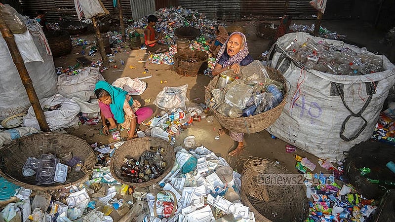 Most workers in these sorting factories are women, earning Tk 3,000 to 4,000 weekly. Photo: Abdullah Al Momin