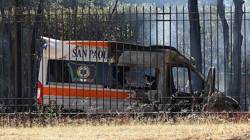 A burnt ambulance is seen after a gas station exploded on the outskirts of Rome, Italy, Jul 4, 2025. REUTERS/Matteo Minnella