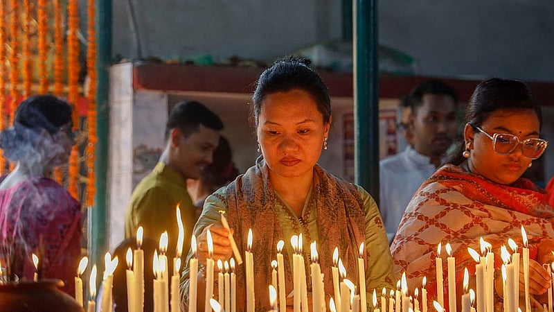 Buddhists celebrate Buddha Purnima or Boishakhi Purnima by lighting candles at the Dharmarajik Buddhist Monastery in Sabujbag on Sunday. Photo: Mahmud Zaman Ovi