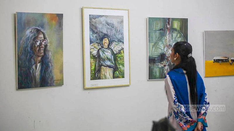 A visitor looks at a painting at the Zainul Gallery of the Faculty of Fine Arts at Dhaka University during the exhibition marking the birth centenary of artist SM Sultan. Photo: Abdullah Al Momin