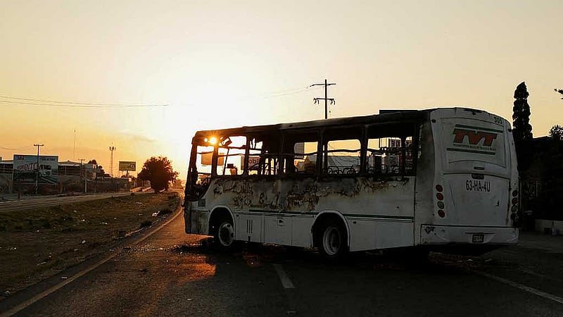 A burnt bus set up as a blockade by members of organized crime following a military operation in which Mexican officials said cartel boss Nemesio Oseguera, &amp;quot;El Mencho,&amp;quot; was killed, at a tourist area, in Zapopan, Mexico, Feb 22, 2026. Photo: Reuters