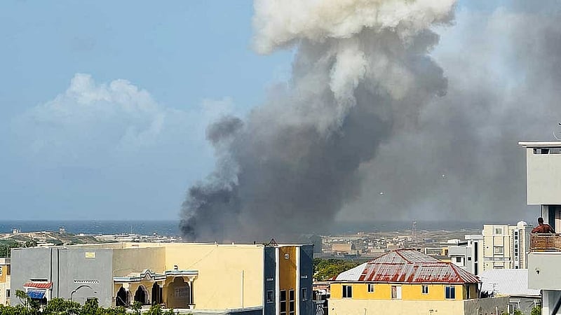 Smoke rises in the direction of Aden Adde airport in Mogadishu, Somalia, Jul 2, 2025, in this picture obtained from social media, Abdirahman Mohamed Arab/via REUTERS