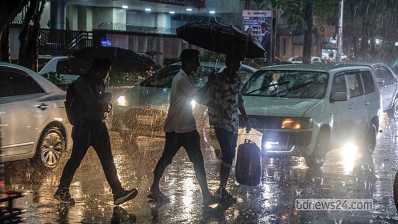 After enduring intense heat for days in the Bengali summer month of Baishakh, Dhaka residents get some respite from the rain on Sunday, Apr 26, 2026, though those outdoors face disruption due to wind and rain. Photo: Abdullah Al Momin