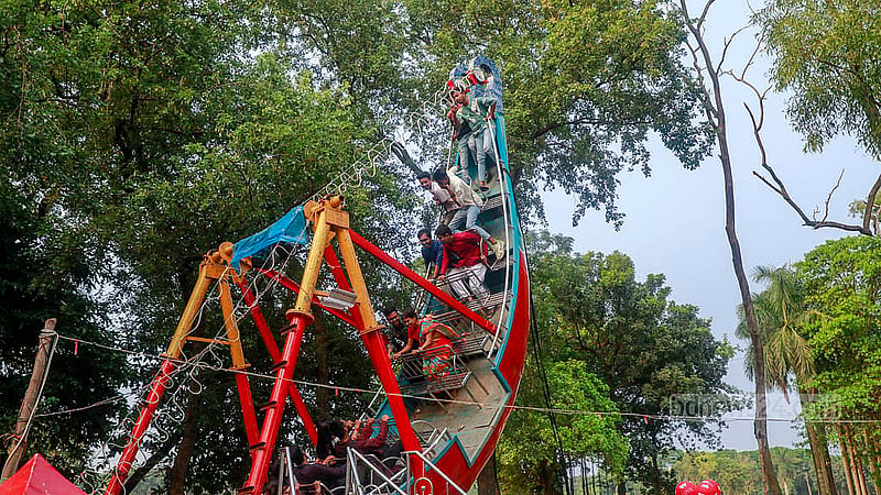 Several rides are set up for the entertainment of children as well as adults outside the Ramna Kali Temple during the Durga Puja celebrations.