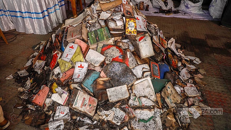 A variety of books burnt in the attack and arson on the second floor of the central office of Udichi Shilpigosthi are stacked for display on Tuesday, Jan 13, 2026. Photo: Mahmud Zaman Ovi