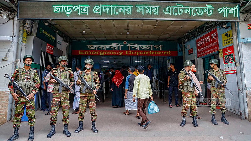 Army personnel stand guard outside the accident and emergency ward of Dhaka Medical College Hospital on Sunday, Sept 01, 2024. They have been guarding the emergency unit since morning as medical services remain suspended for all departments of the hospita