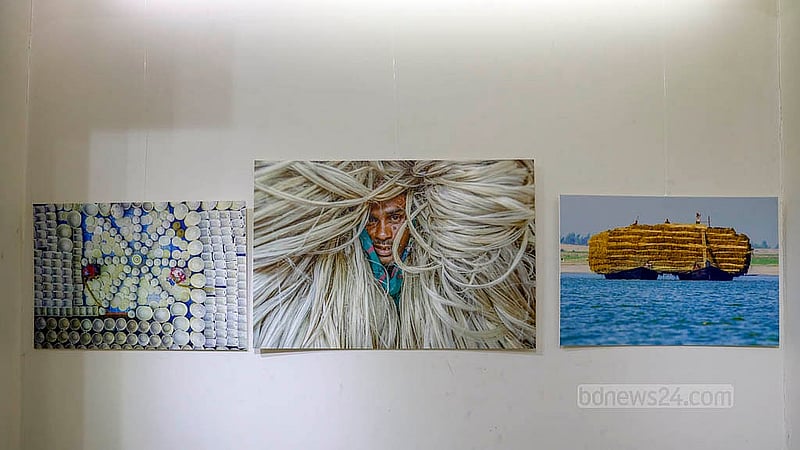 Visitors tour the “Love and Life Through My Eyes” photography exhibition at the Bishwo Shahitto Kendro (BSK) in Dhaka. Photo: Mahmud Zaman Ovi