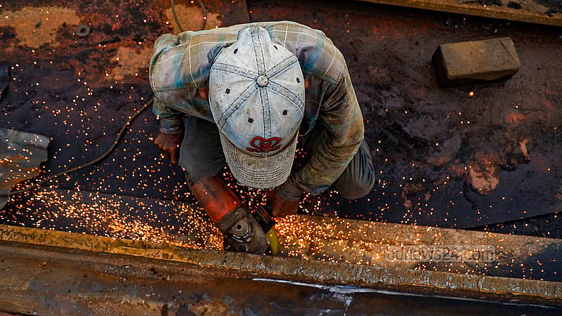 Day labourers often do not know about the May Day public holiday. They work over 10 hours a day to earn around Tk 12,000 a month. They have to keep working on the holiday to try and eke out a living. Photo: Mahmud Zaman Ovi