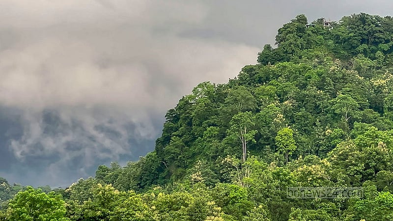 Green, cloud-capped hills can be seen on the banks of Kaptai Lake. Photo: Samir Mallik