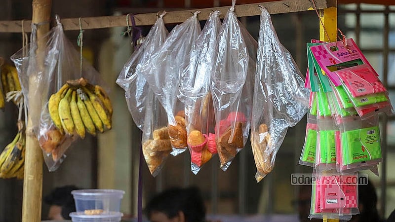 Makeshift shops inside Sohrawardy Udyan in Dhaka provide food items using banned polythene. Photo: Abdullah al Momin