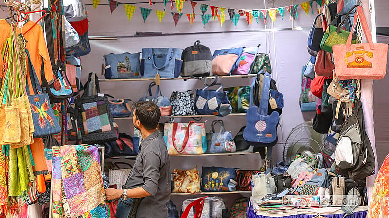 Shopkeepers have set up stalls of different products on Saturday, Apr 18, 2026, at the Baishakhi Fair at the Bangla Academy.