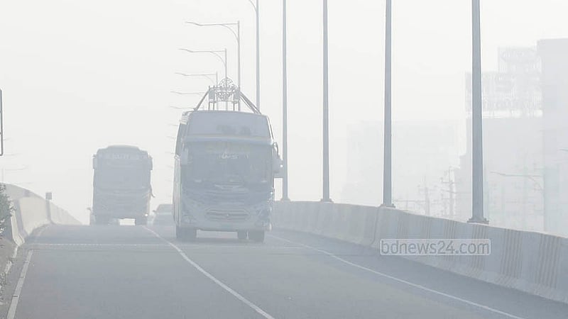 Several vehicles, including motorcycles, speed through the fog in the Abdullahpur area of the Dhaka–Mawa Expressway. Photo: Abdullah Al Momin