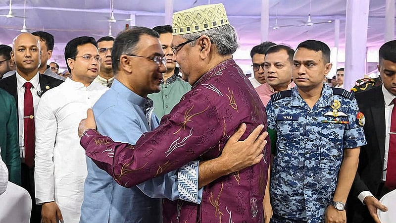 President Md Shahabuddin and Prime Minister Tarique Rahman exchange a traditional embrace following the main Eid-ul-Fitr prayers at the National Eidgah on Saturday, Mar 21, 2026. Photo: PMO