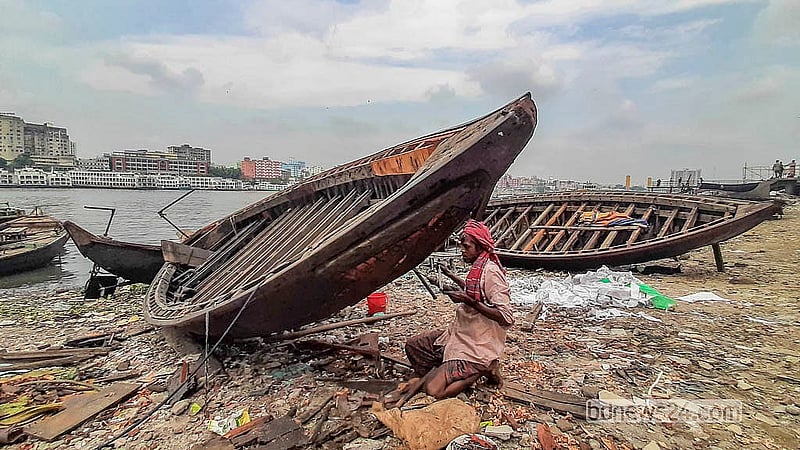 Jaber Ahmed has been building and repairing boats on the banks of the Buriganga River for more than two decades. Photo: Abdullah Al Momin