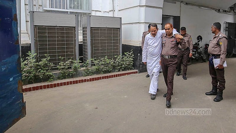 Former information minister and Jatiya Samajtantrik Dal President Hasanul Haq Inu is being assisted into a prison van on Tuesday, Mar 10, 2026, following a hearing at the International Crimes Tribunal.