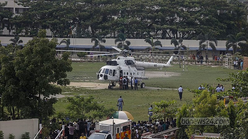 A victim is being airlifted from the crash site after a Bangladesh Air Force training jet went down in the Milestone School and College compound. Photo: Mahmud Zaman Ovi