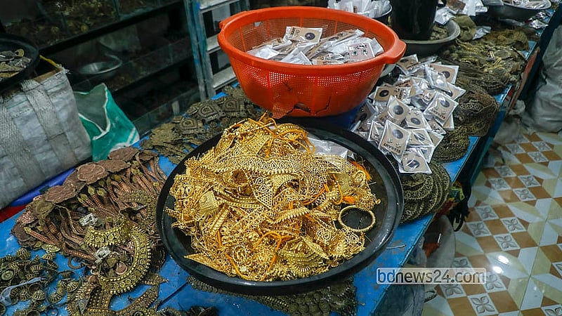 Artisans in Savar’s Bhakurta solder intricate jewellery pieces, which are supplied to markets across the country. Photo: Abdullah Al Momin