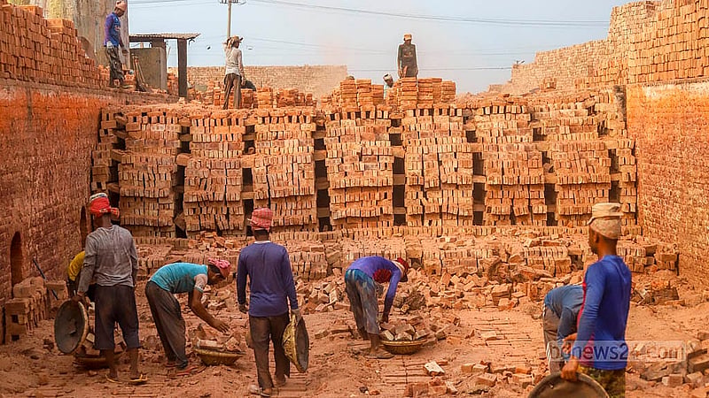 Finished bricks are taken out of the furnace at the brickfields on the banks of the Dhaleshwari River in South Keraniganj's Jazira. Photo: Abdullah al Momin