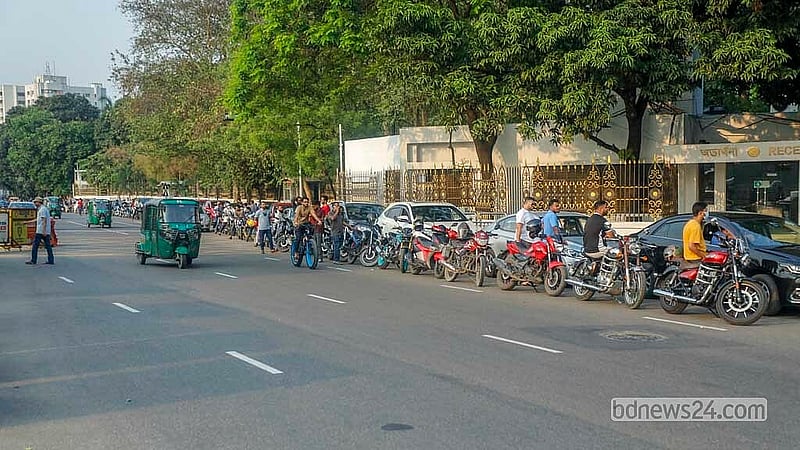 Hundreds of motorcycles wait outside the same Trust Filling Station at Tejgaon’s Ellenbari on Monday, Mar 23, 2026. Photo: Abdullah Al Momin