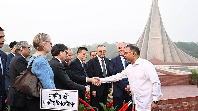 Prime Minister Tarique Rahman interacts with foreign diplomats at the National Memorial in Savar following the wreath-laying ceremony on Thursday, Mar 26, 2026. Photo: PID