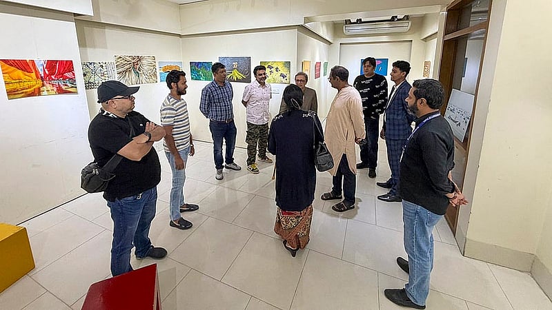 Visitors tour the photography exhibition titled “Love and Life Through My Eyes” at Dhaka’s Bishwo Shahitto Kendro (BSK).