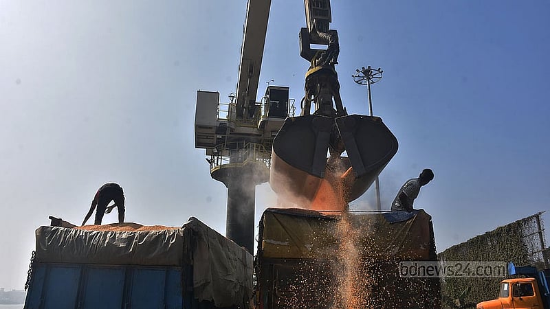Workers unload corn imported from the United States at the Karnaphuli River wharf in Chattogram on Wednesday, Jan 7, 2026. Photo: Suman Babu