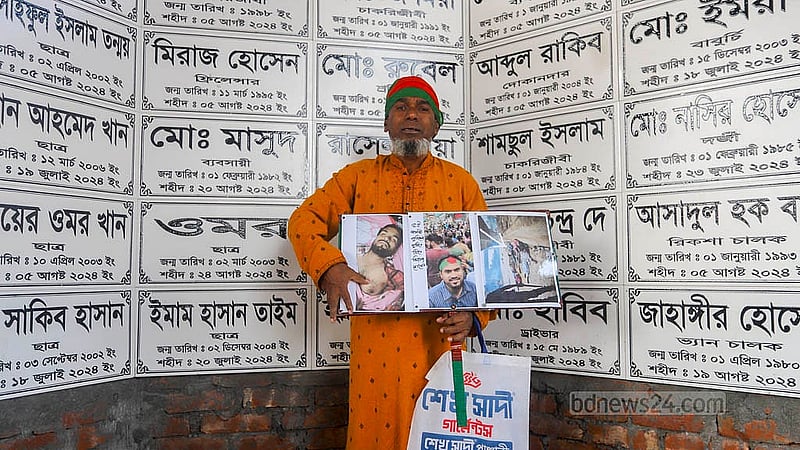 Miraz Hossain was shot dead by police outside the Jatrabari Police Station during the Anti-discrimination Student Movement on Aug 5. The victim’s father showing his son’s name inscribed on the “Shahidi Oikya Chattar” memorial. Photo: Abdullah al Momin