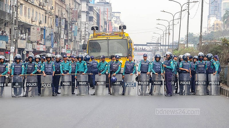 Law-enforcing agencies remain on alert as garment workers blocked the road at Chairman Bari U-turn in Banani on Monday, Mar 10, 2025, after a female colleague was killed in a road accident.  Photo: Abdullah al Momin